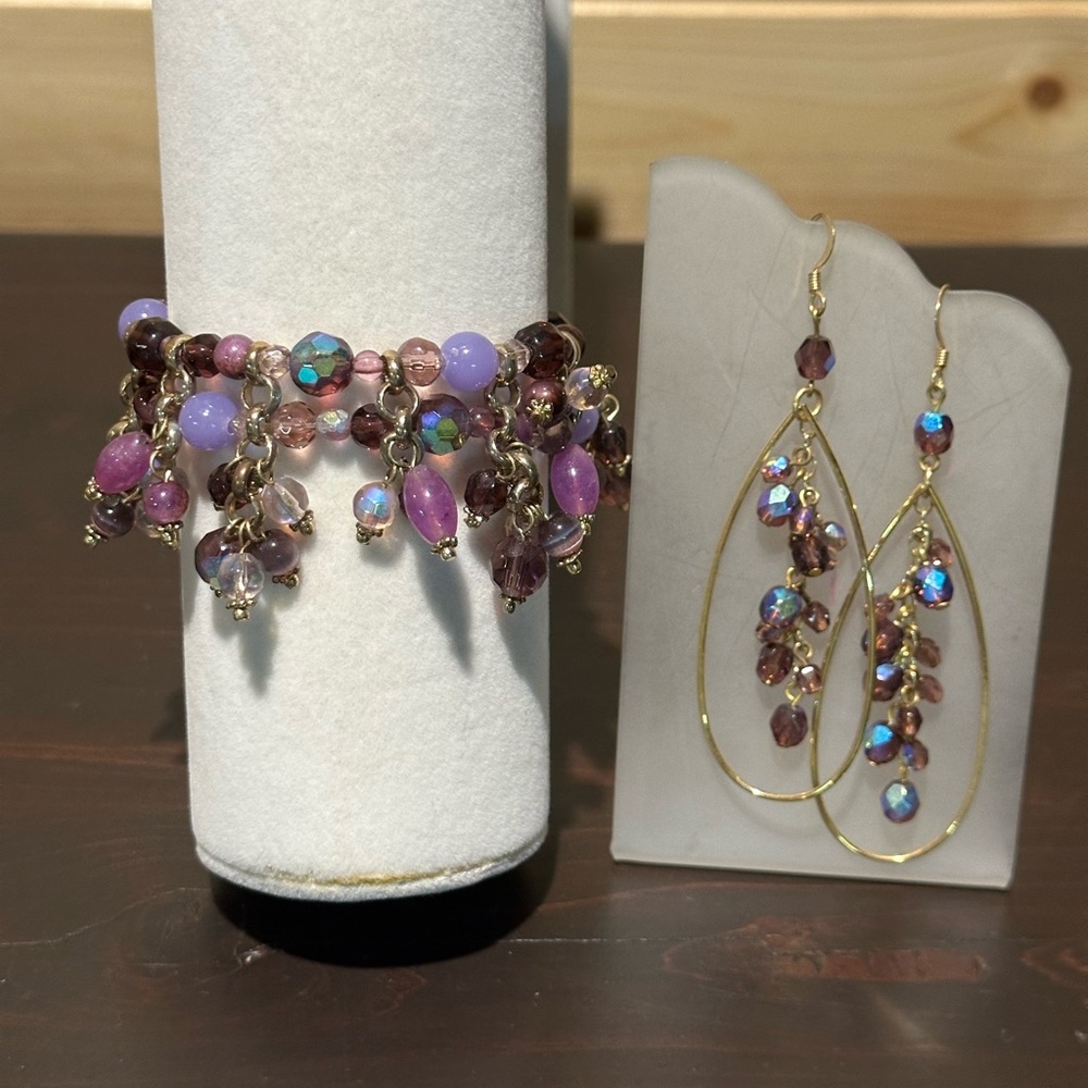 Beautiful beaded purple bracelet and earrings.